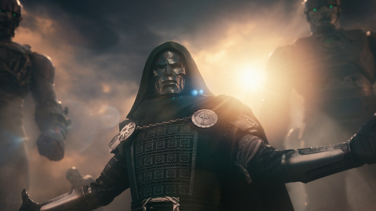 Doctor Doom wears a metal mask and green hood in an official Avengers: Doomsday still.