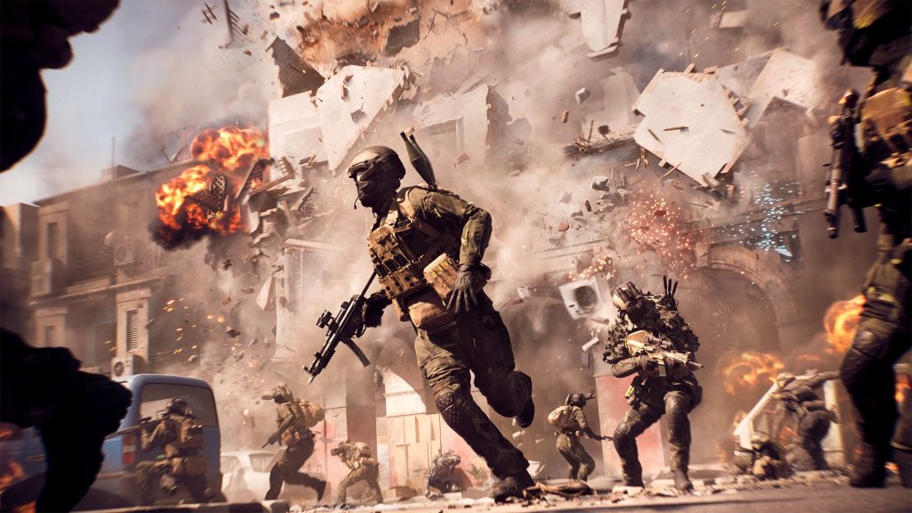 Soldiers run through a street as a building breaks apart behind them in Battlefield 6.