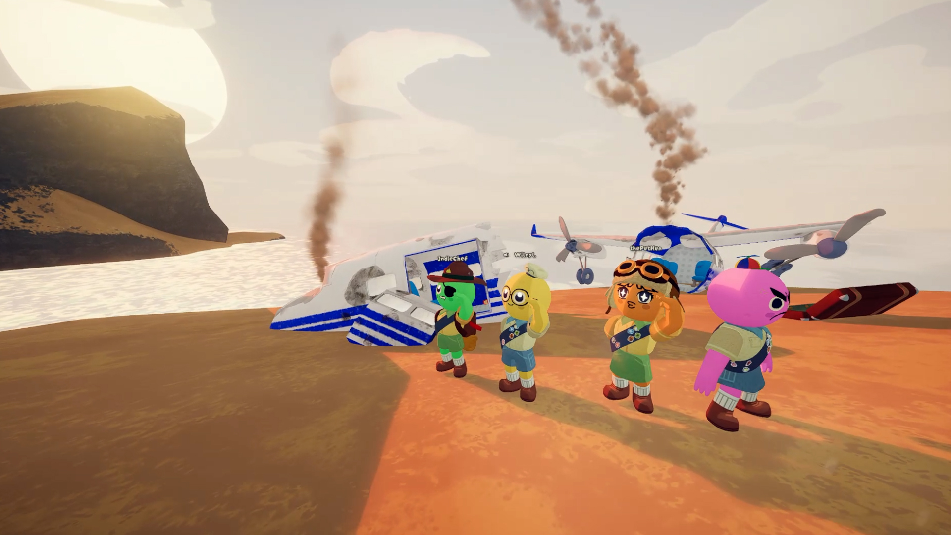 Four colourful PEAK scouts stand on a beach beside the smoking wreck of an aeroplane.
